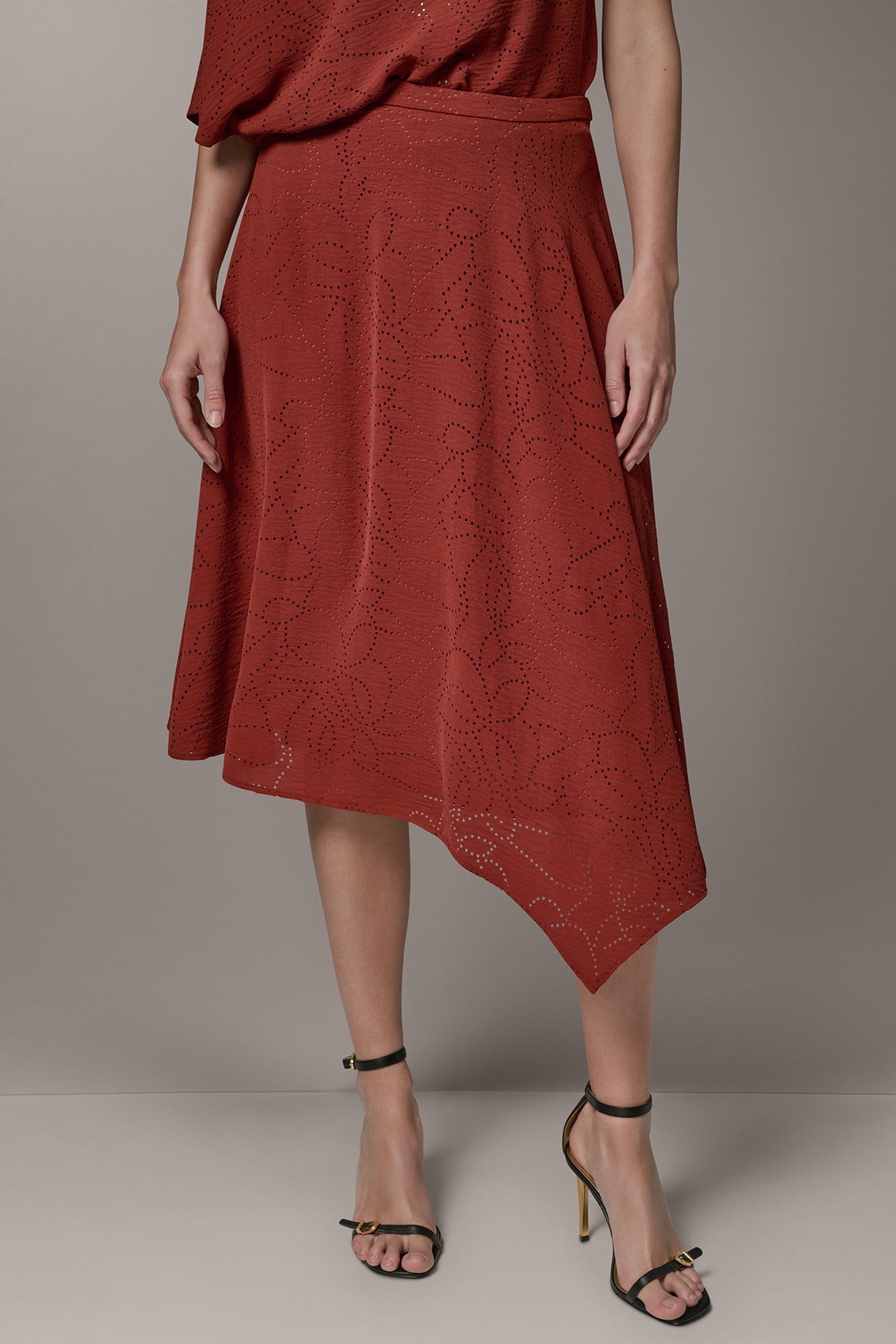 Sunbaked LASER CUT ASYMMETRIC MIDI SKIRT Donna Karan