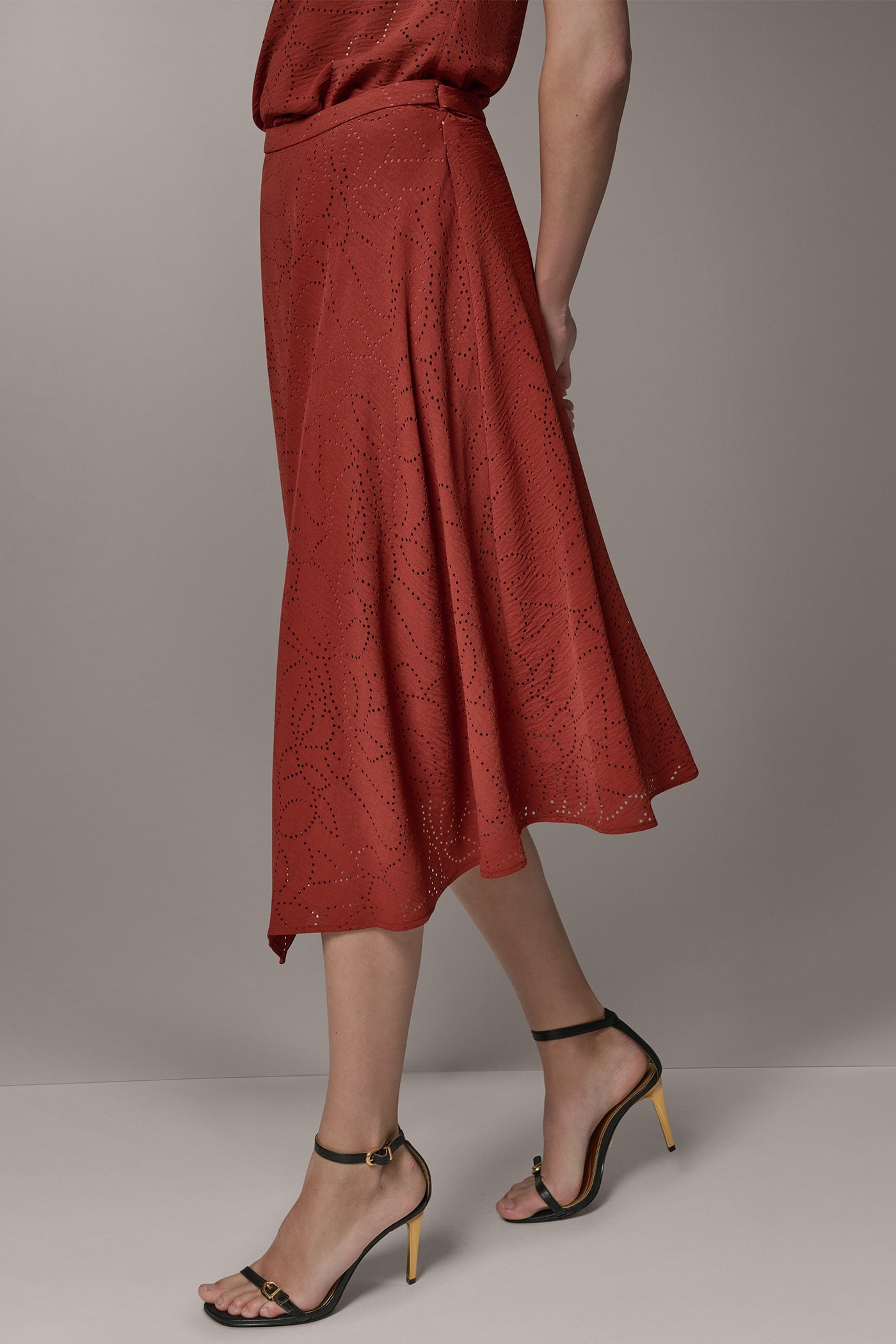 Sunbaked LASER CUT ASYMMETRIC MIDI SKIRT Donna Karan