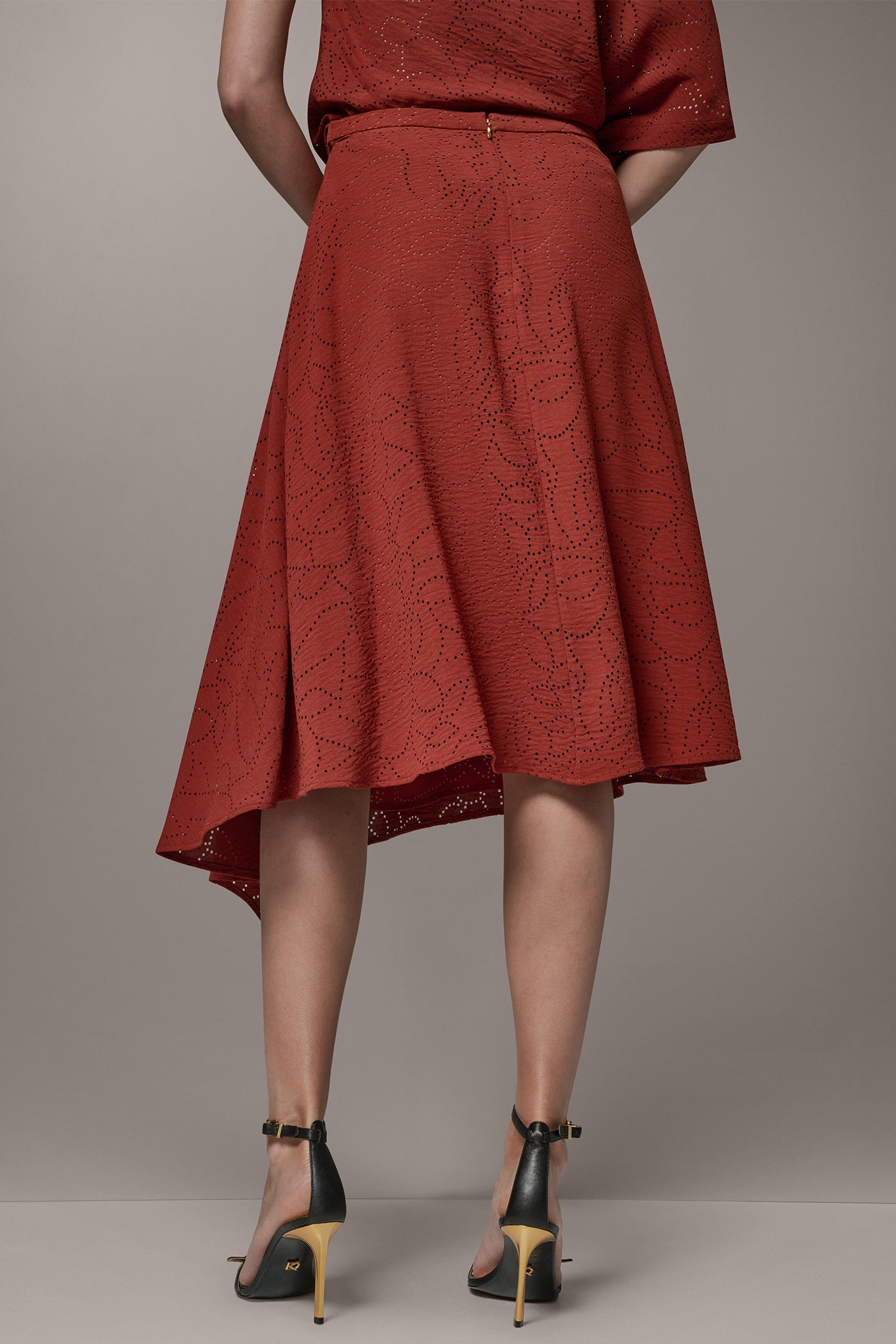 Sunbaked LASER CUT ASYMMETRIC MIDI SKIRT Donna Karan
