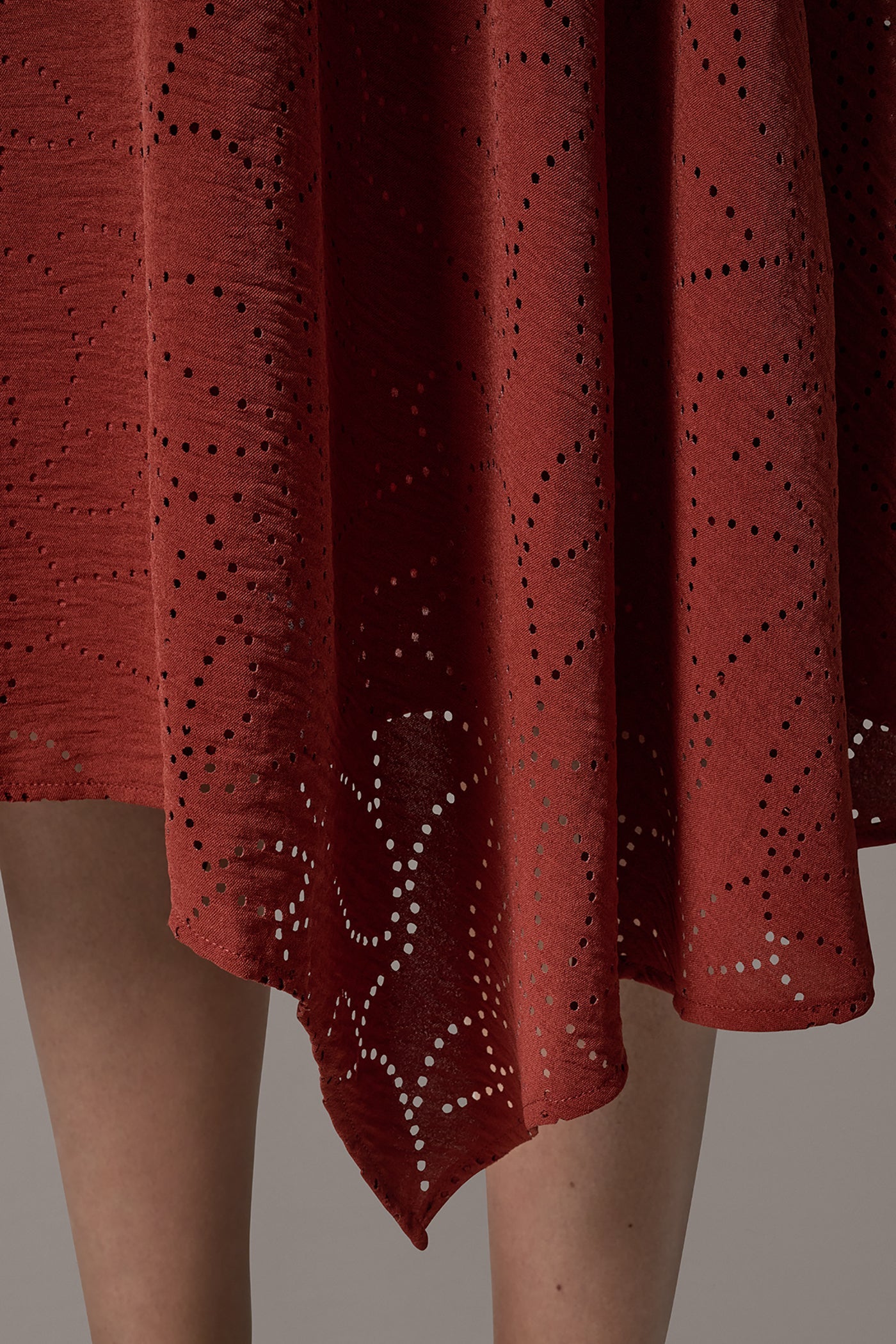 Sunbaked LASER CUT ASYMMETRIC MIDI SKIRT Donna Karan