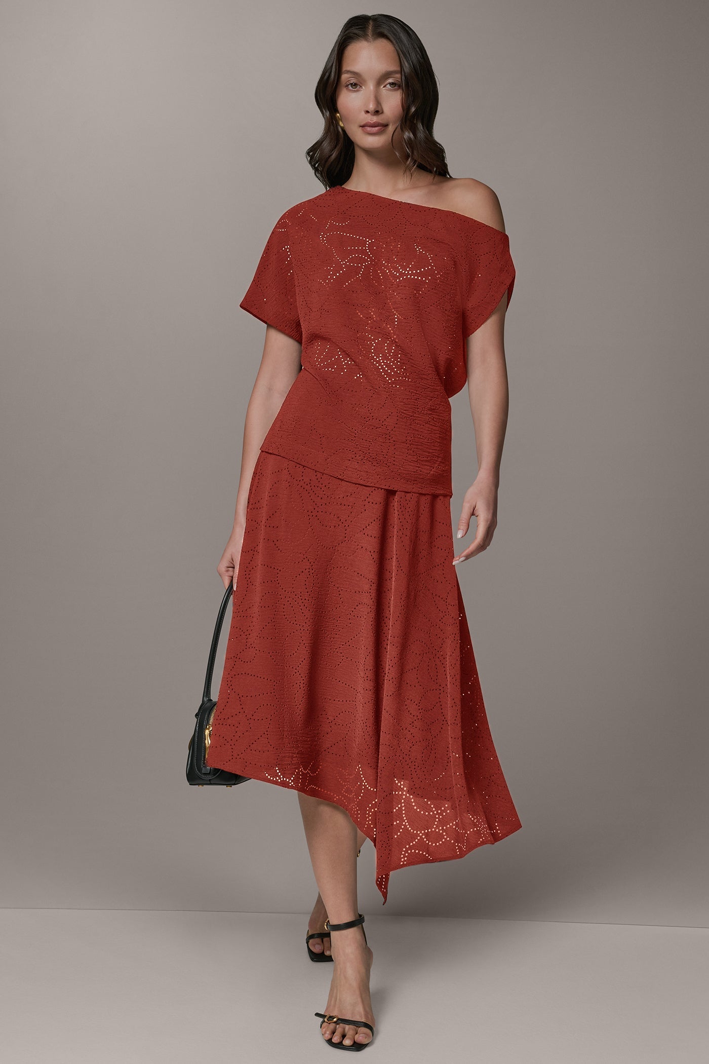 Sunbaked LASER CUT ASYMMETRIC MIDI SKIRT Donna Karan