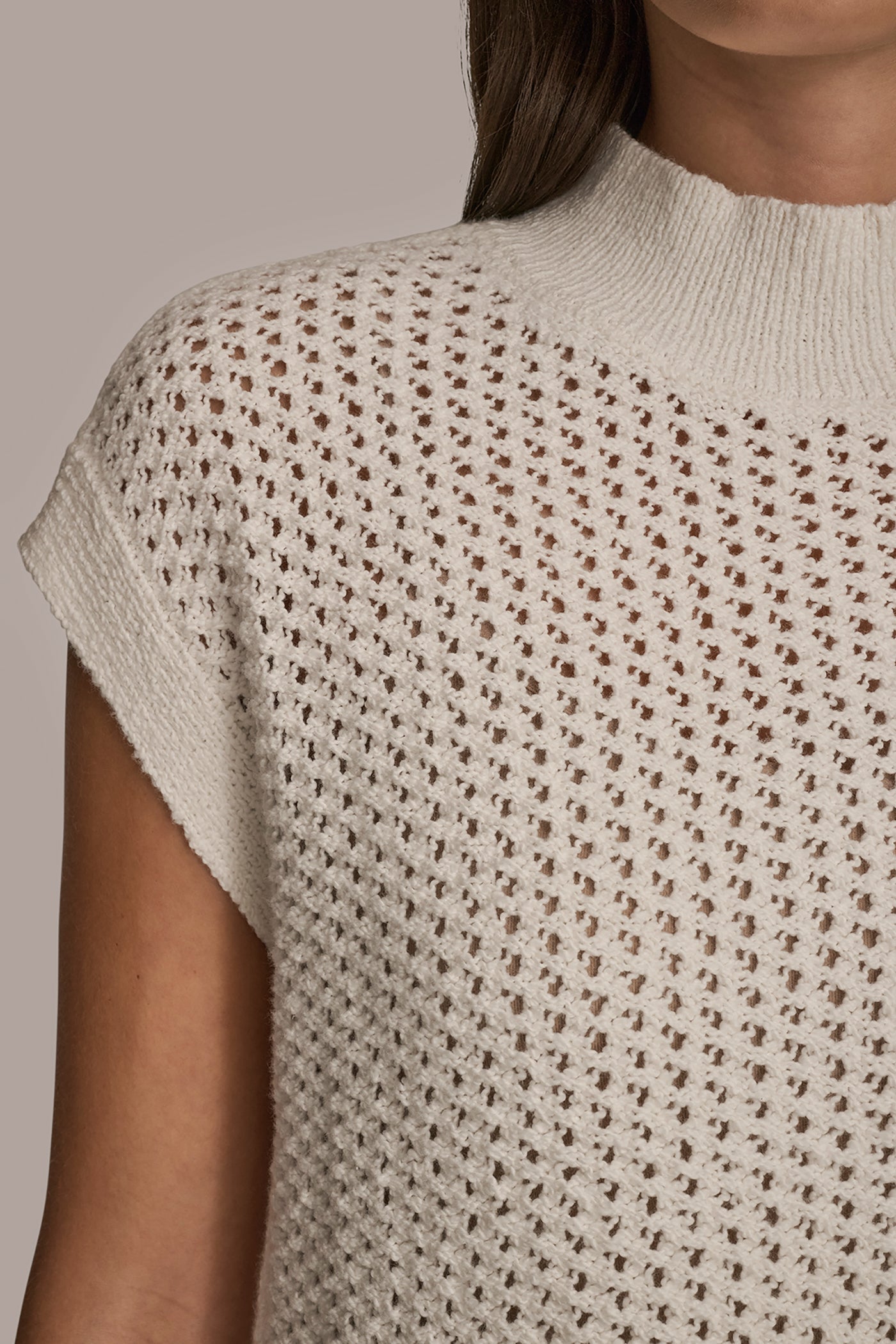 CREAM SLEEVELESS MOCK-NECK OPEN STITCH SWEATER Donna Karan