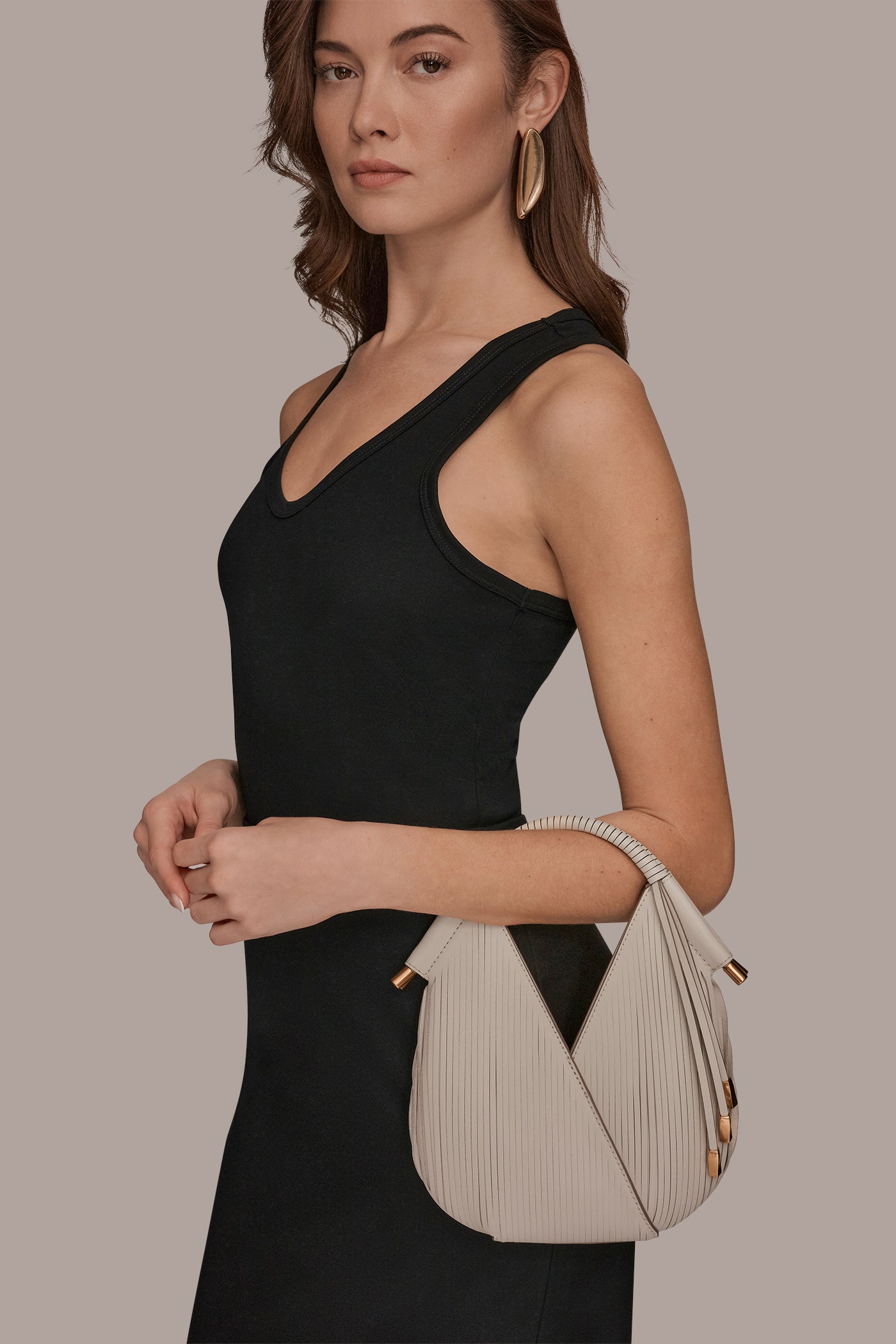 Sand BALDWIN LASER-CUT LEATHER MICRO CROSSBODY BAG Donna Karan
