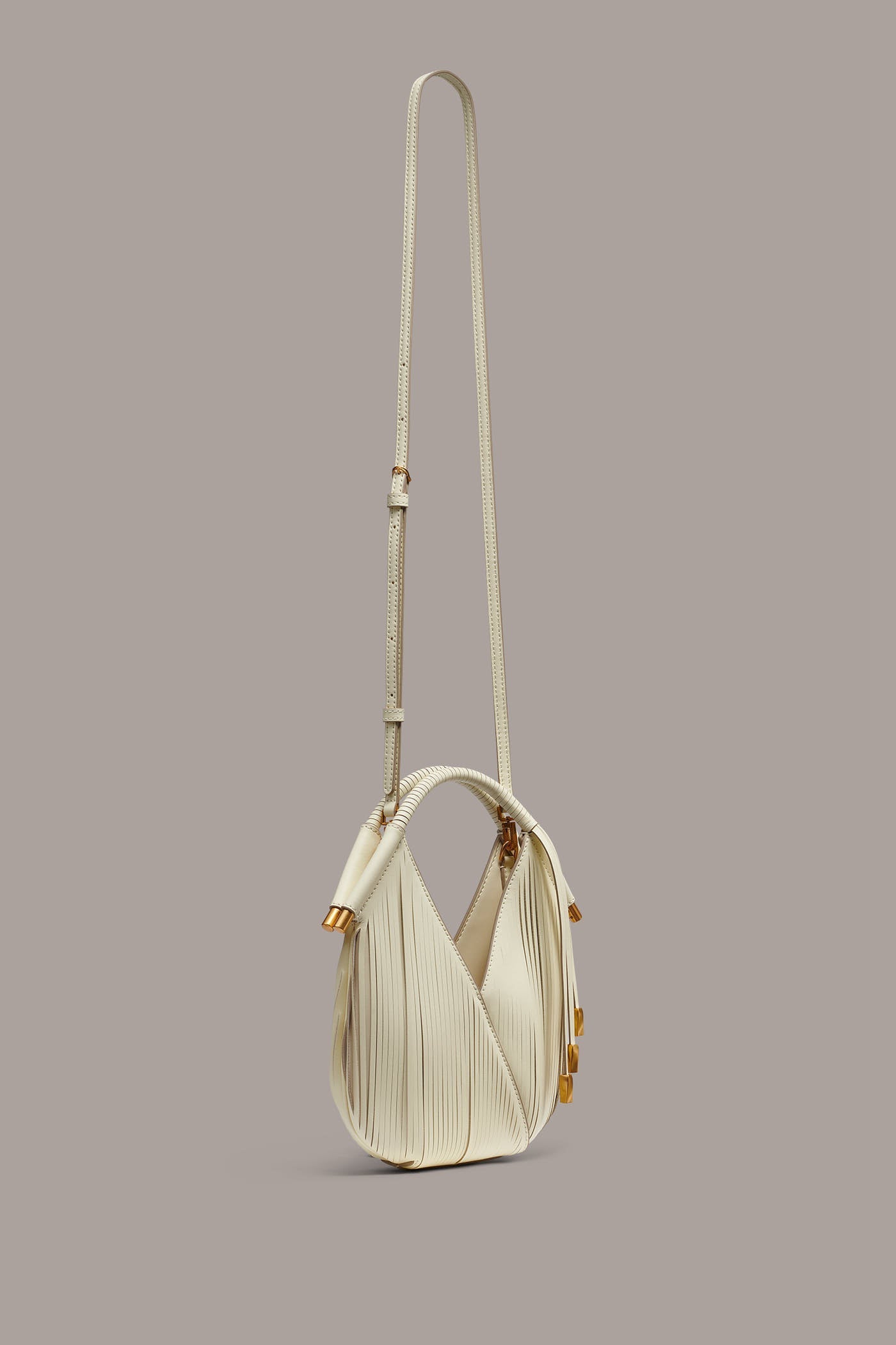 Butter Cream BALDWIN LASER-CUT LEATHER MICRO CROSSBODY BAG Donna Karan