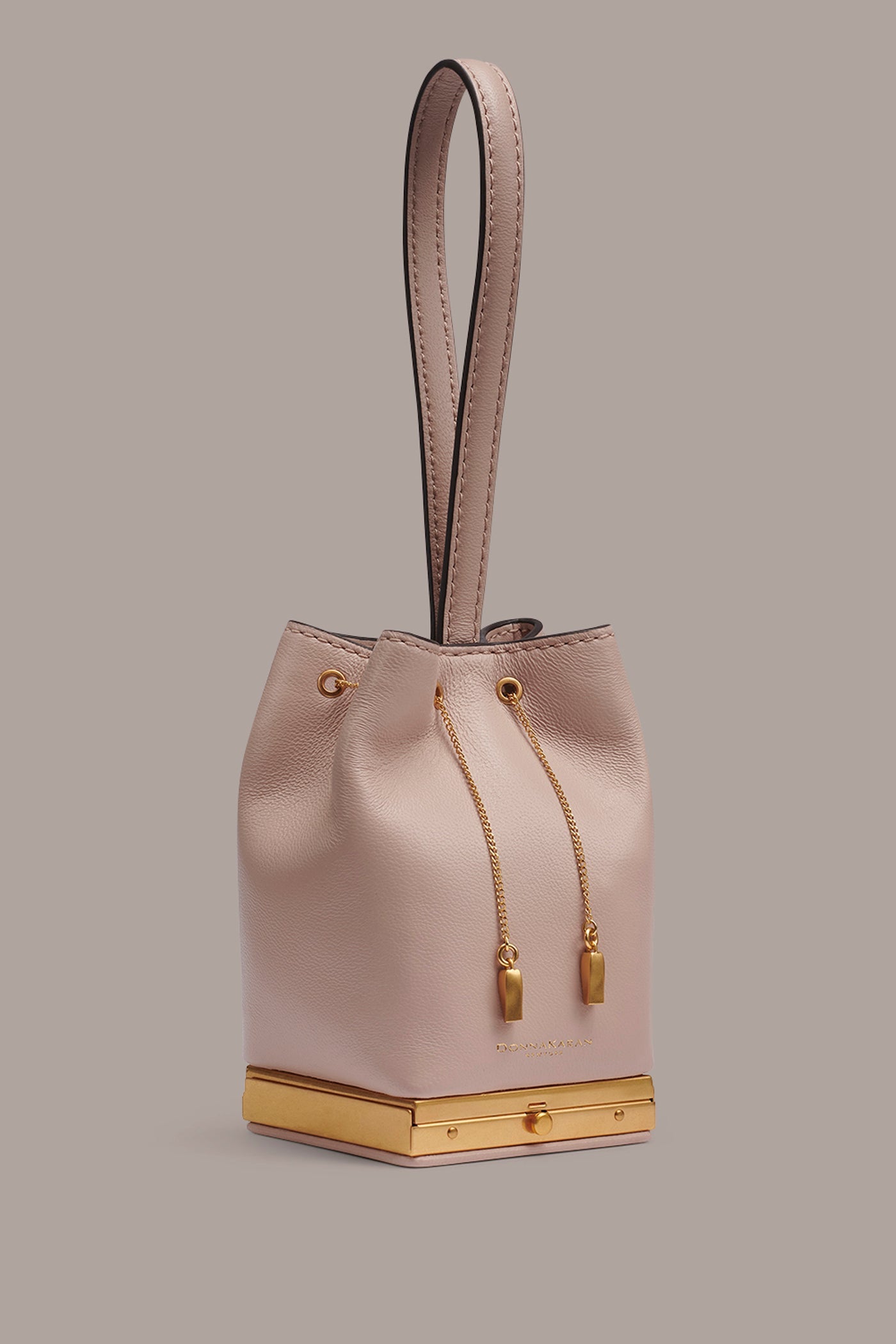 Snow Petal SISAL LEATHER CLUTCH Donna Karan
