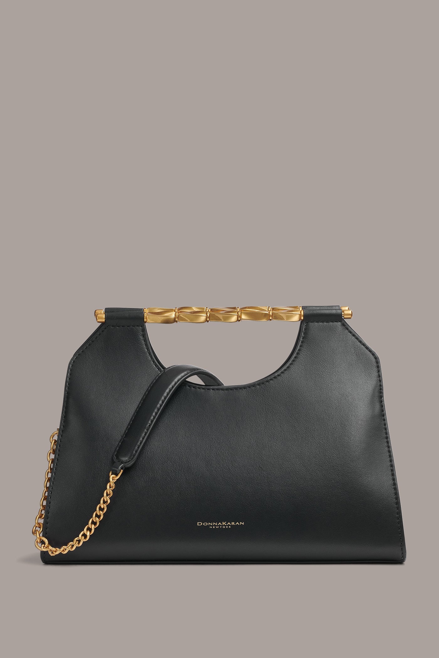 Black COMMACK CLUTCH Donna Karan