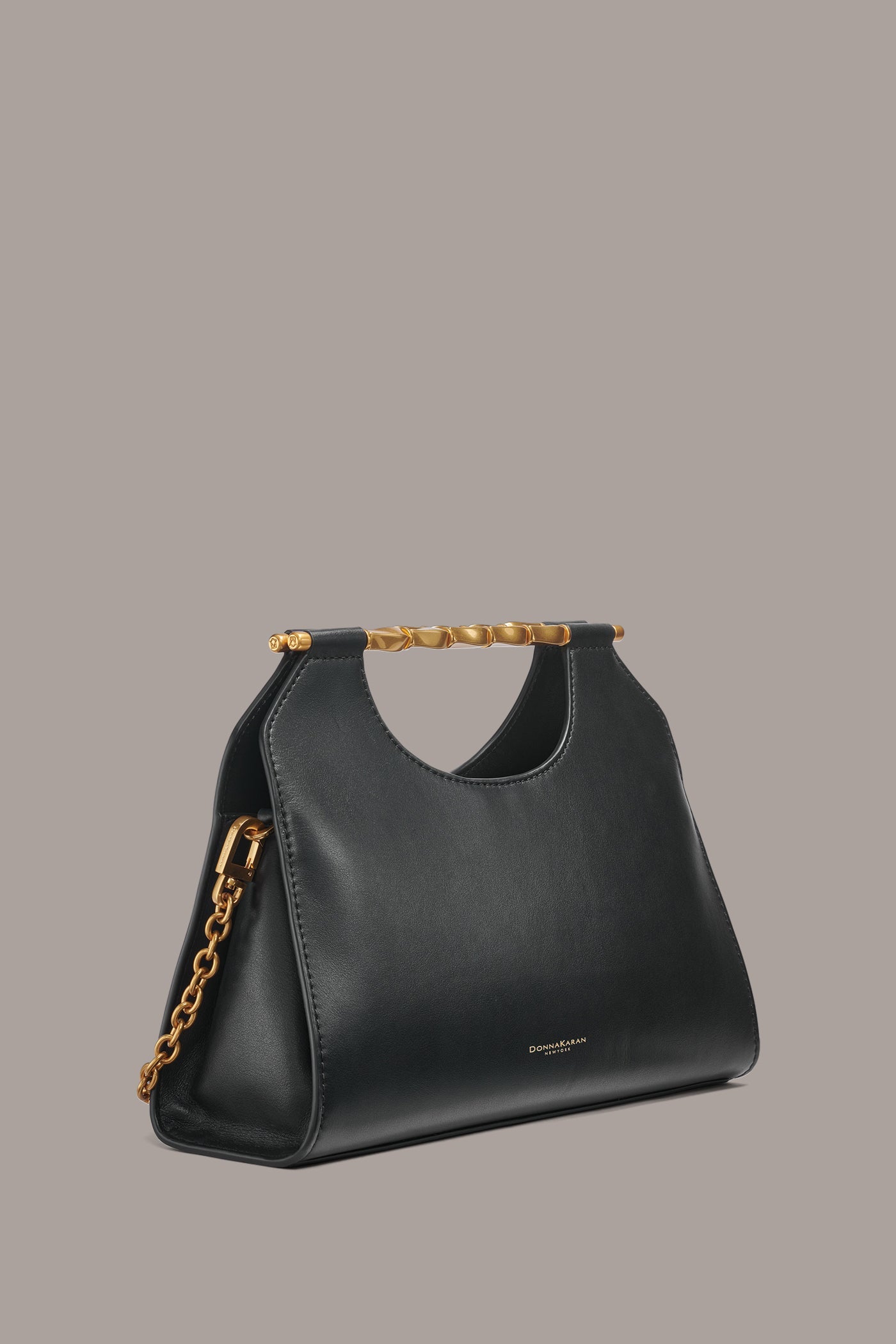 Black COMMACK CLUTCH Donna Karan