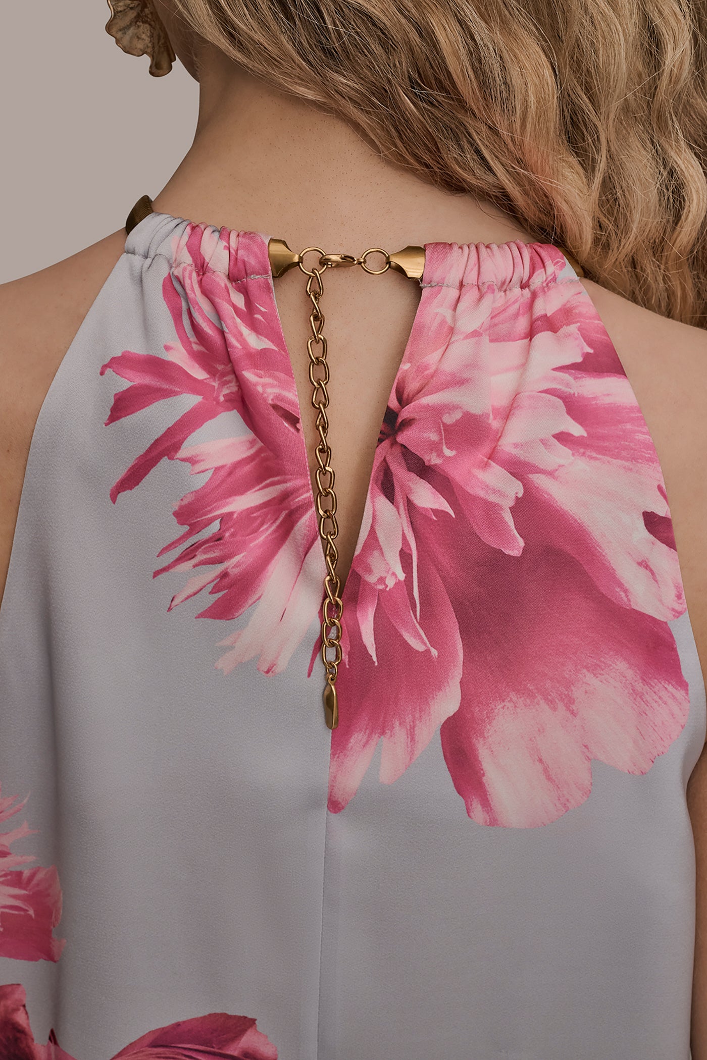 PINK SANDS MULTI FLORAL TWIST-NECK HALTER BLOUSE Donna Karan