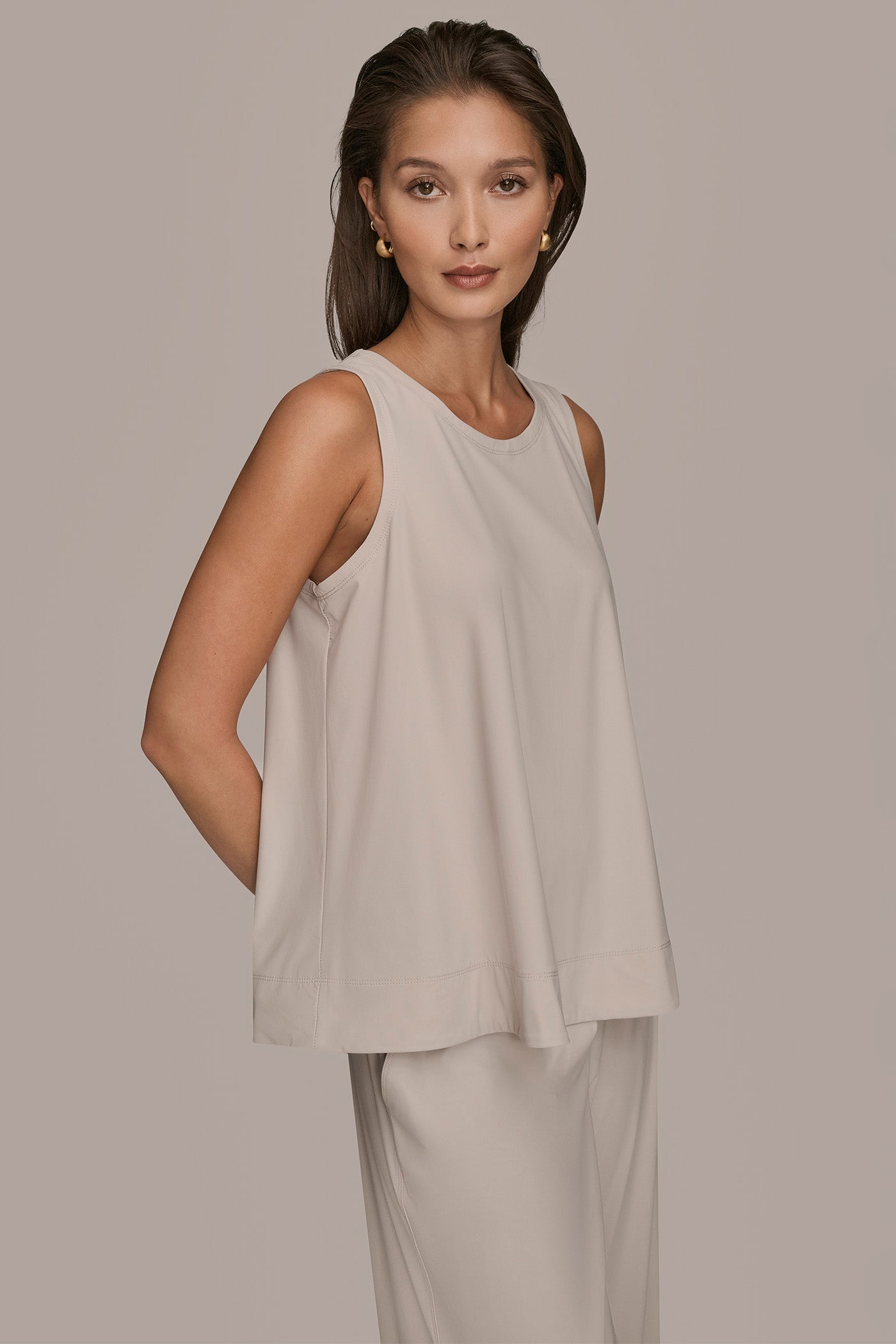 VAPOR THE MODERN TRAVEL SLEEVELESS SWING TANK Donna Karan