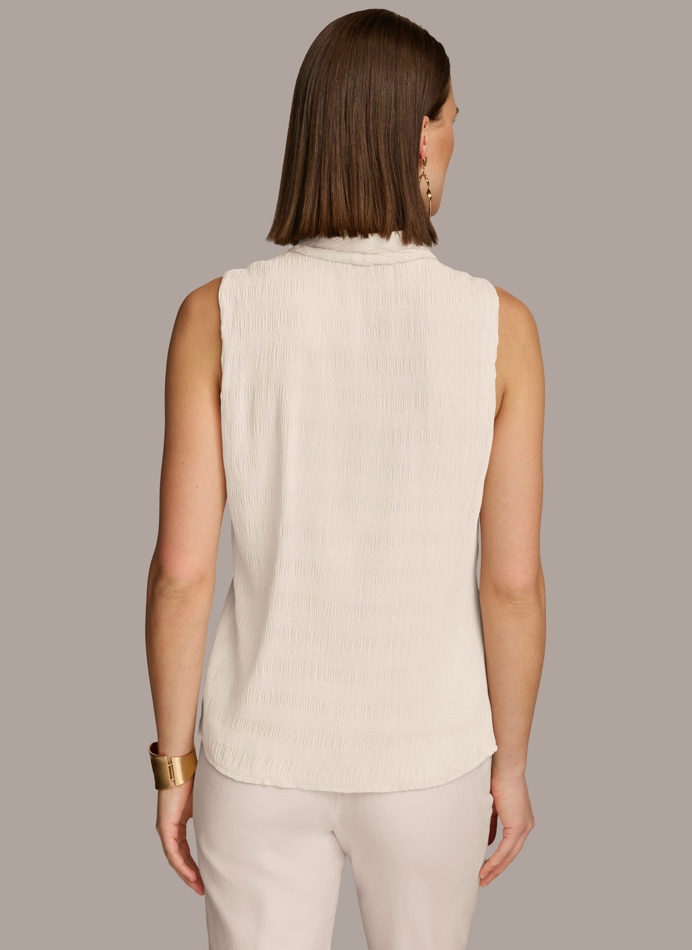 Cream FAUX WRAP PEPLUM TOP Donna Karan